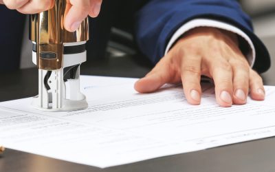 Notary public in office stamping document Notary public in office stamping document