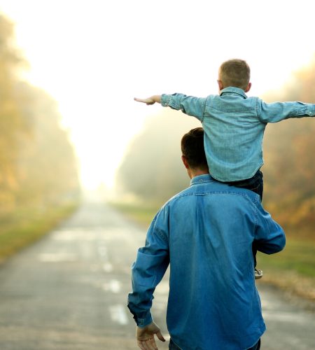 father and son walk in nature happy father and son walk in nature
