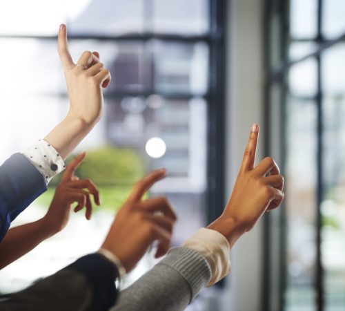 Hands up, workshop or business people in presentation asking questions for an answer or ideas. Teamwork, faq or employees with hand raised in group discussion meeting for problem solving or solution Hands up, workshop or business people in presentation asking questions for an answer or ideas. Teamwork, faq or employees with hand raised in group discussion meeting for problem solving or solution.